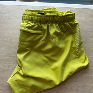 Yellow/green Oiselle running shorts